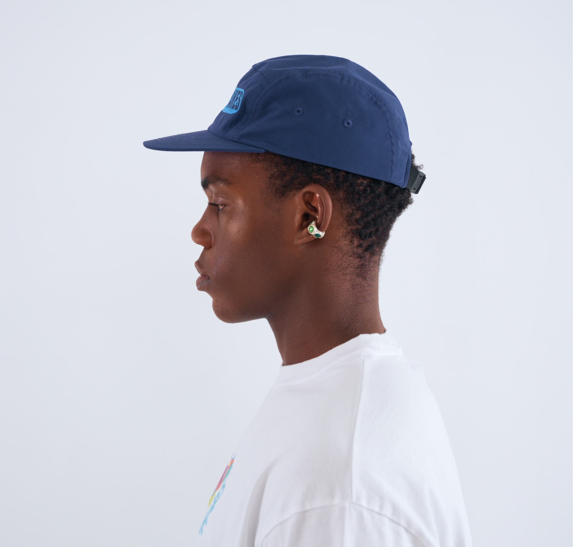 Graphic depicting a hexagonal cropped photo of an interior room design with grid lines along its borders.